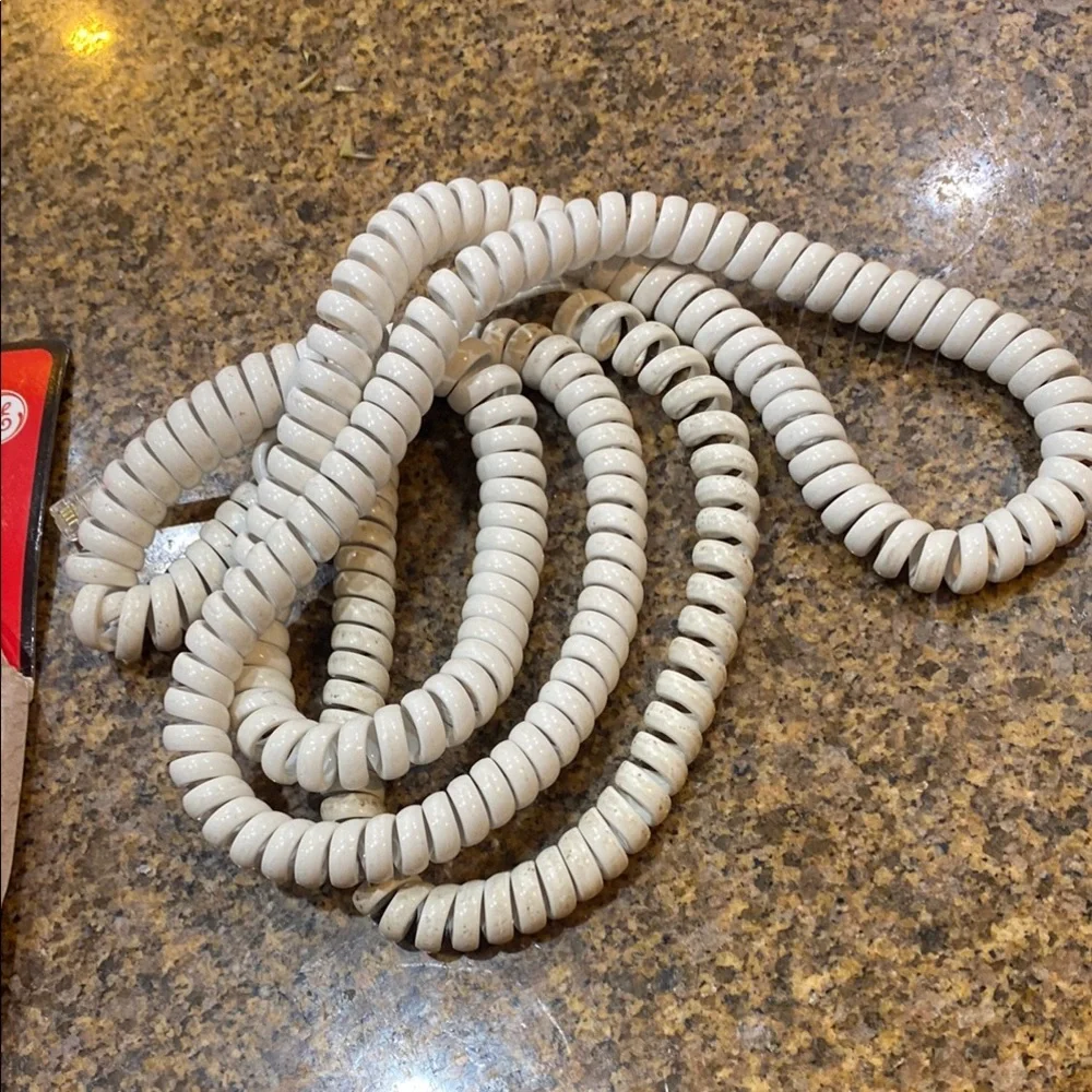 Vintage GE brand White Coil Cord 15 ft. Never used, still in original package.
